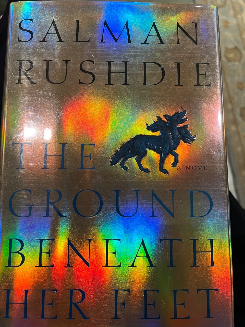 The Ground Beneath Her Feet — Holographic Multicolor Hardcover